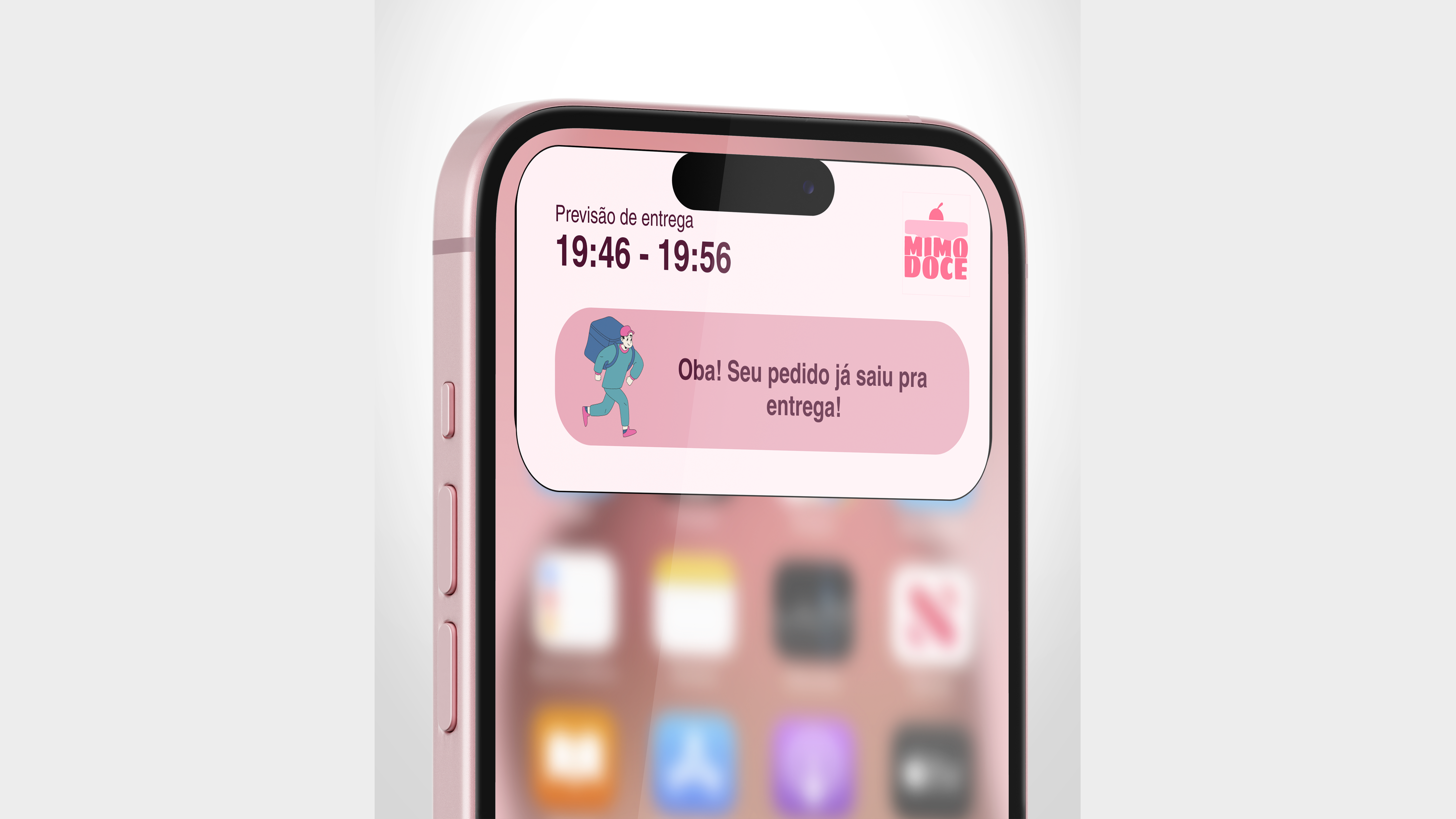 Close-up of a pink iPhone showing a Mimo Doce delivery notification: an estimated delivery window of 19:46–19:56 above a pink card where an illustrated courier runs with a delivery bag next to the message "Oba! Seu pedido já saiu pra entrega!"